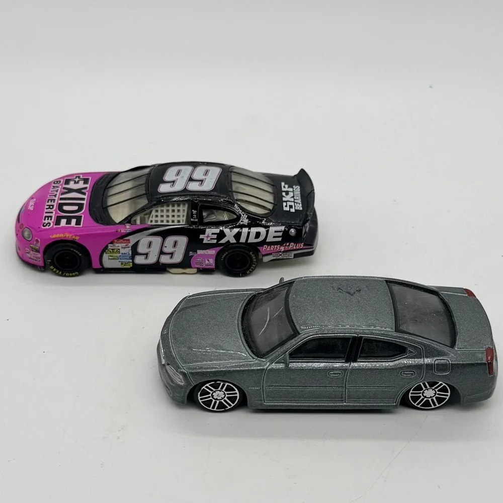 2006 Dodge Charger & #99 Exide Batteries Ford Taurus NASCAR Diecast Cars - Lot 2